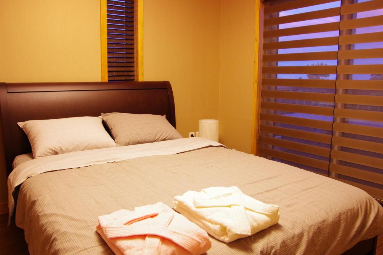 Jeju Eco Suites Согвипхо Номер фото